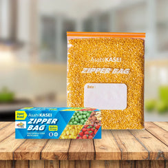 Medium zipper storage bag filled with lentils and product box on wooden table