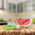Box of Asahi Kasei Premium Wrap and wrapped watermelon wedge on kitchen counter