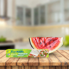 Box of Asahi Kasei Premium Wrap and wrapped watermelon wedge on kitchen counter
