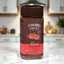 Coorg Valley Blood Orange flavoured instant coffee jar on kitchen counter