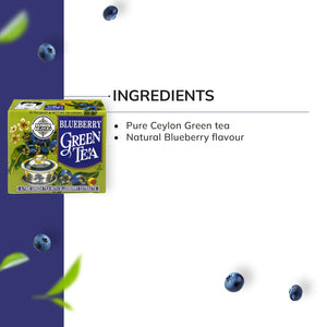 Blueberry green tea box with ingredients list, blueberries, and tea leaves on white background