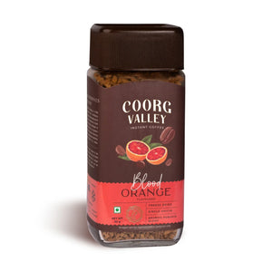 Coorg Valley Blood Orange instant coffee jar, 50g, with coffee beans and orange fruit on label