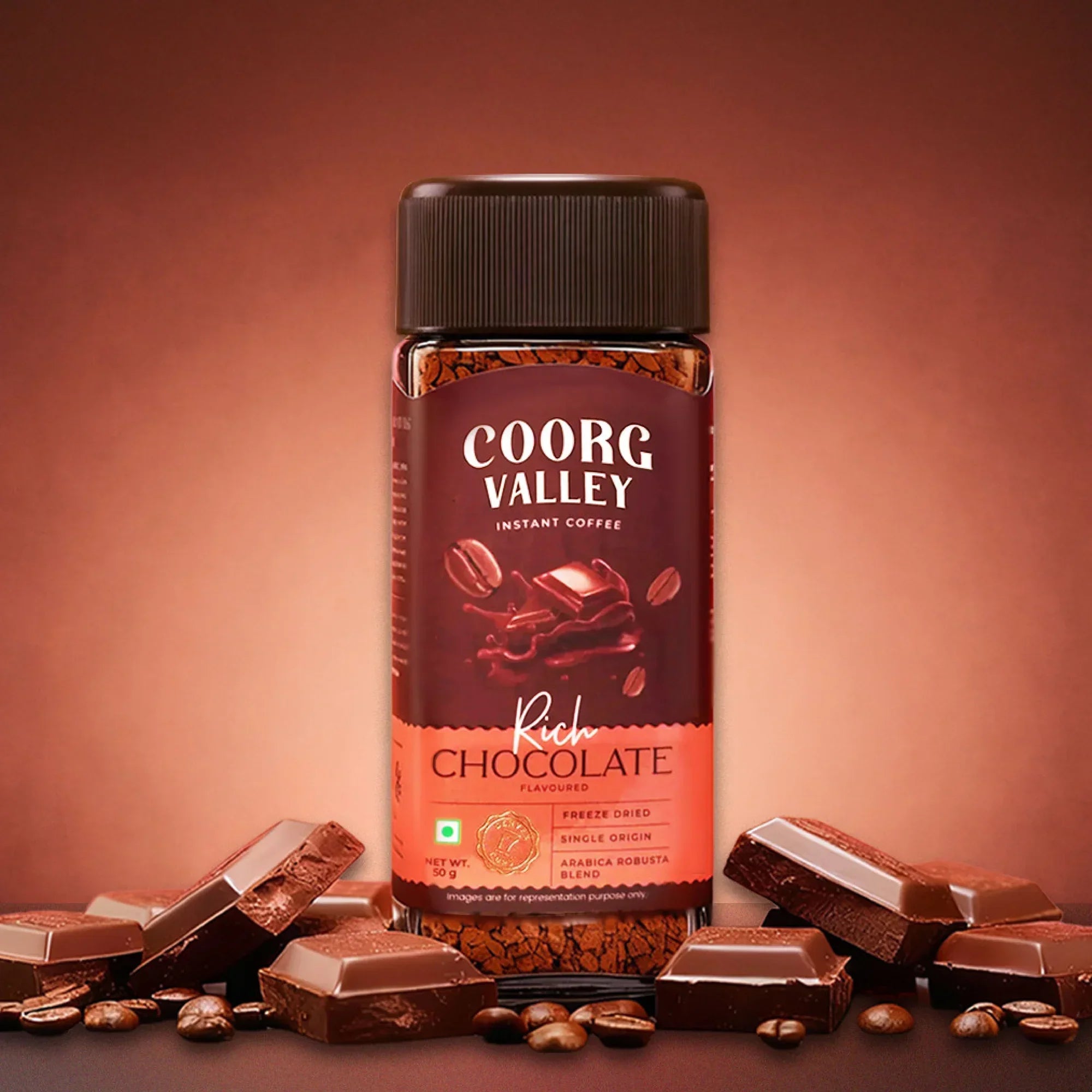 Coorg Valley instant coffee rich chocolate flavor jar with chocolate pieces and coffee beans