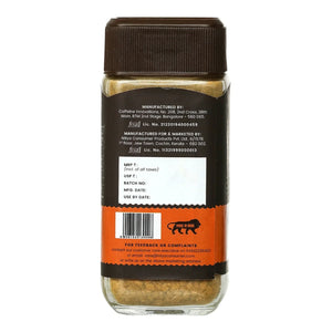 Back view of a glass jar of toffee caramel powder with product details and barcode