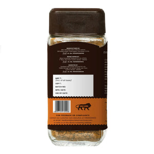 Back label of a gourmet food jar showing manufacturing details and barcode.