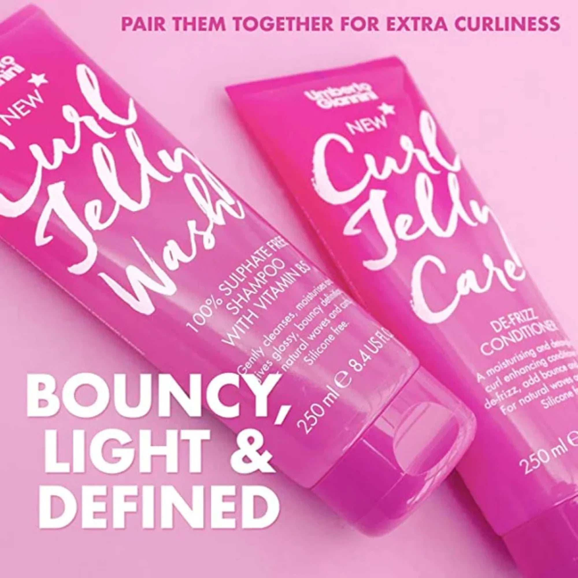 Two pink tubes of Urbanist Queen Curl Jelly Wash shampoo and Curl Jelly Care conditioner promoting bouncy, light, defined curls