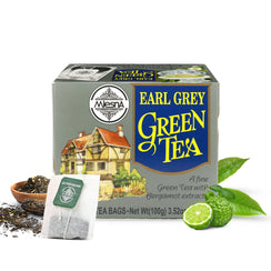 Earl Grey green tea box with tea bag, loose tea leaves, and bergamot fruit with leaves