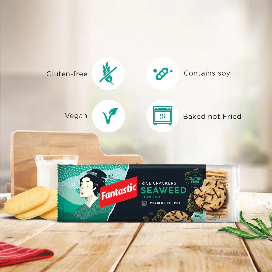 Fantastic seaweed rice crackers pack on wooden table, gluten-free, vegan, baked, contains soy.