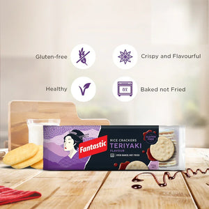 Teriyaki rice crackers in a purple pack, gluten-free, baked not fried, on a kitchen table.