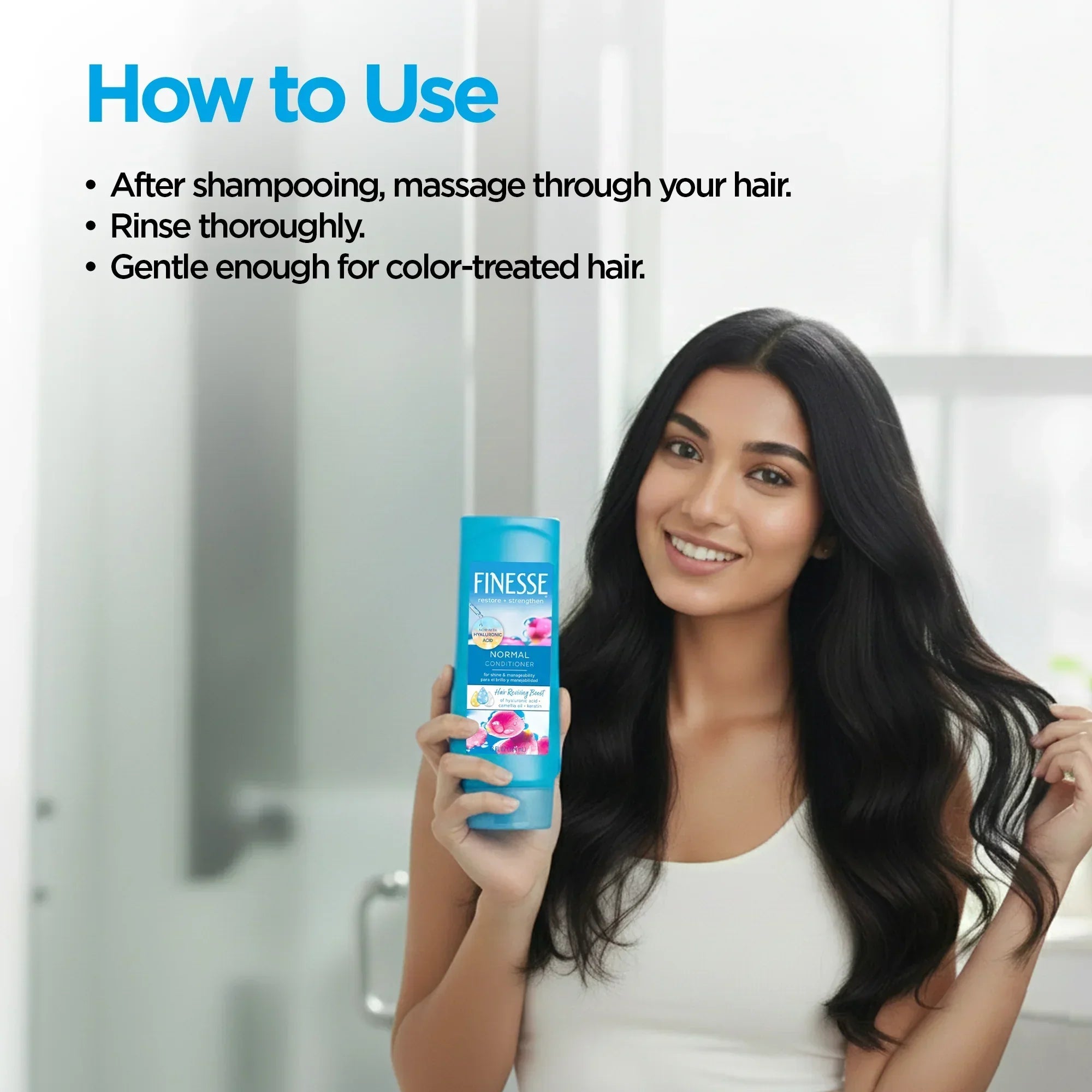 Smiling woman with long black hair holding Finesse Normal Conditioner bottle with hair care usage instructions