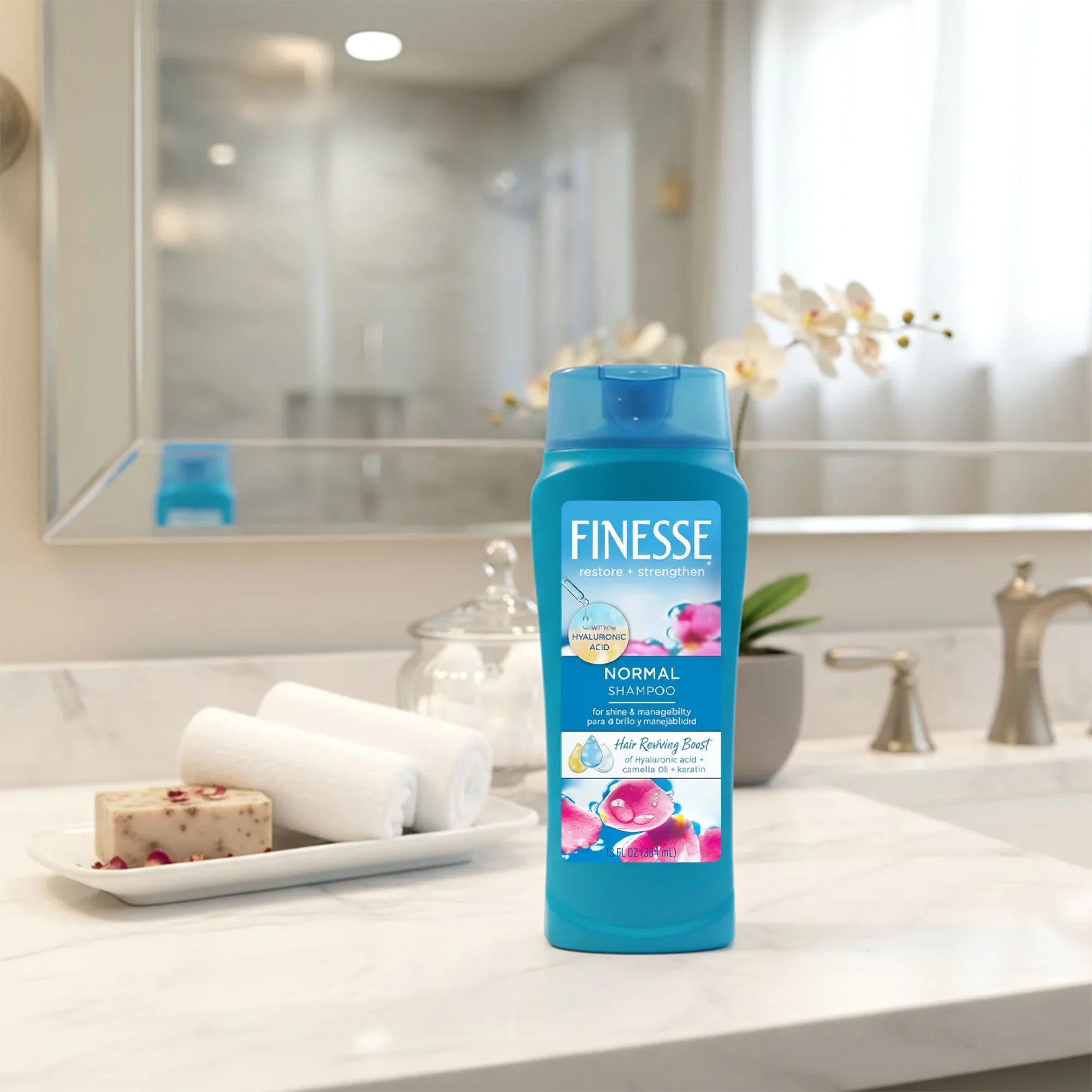 Finesse Normal Shampoo bottle on marble bathroom counter with towels and soap at Sunbeam Merchantile