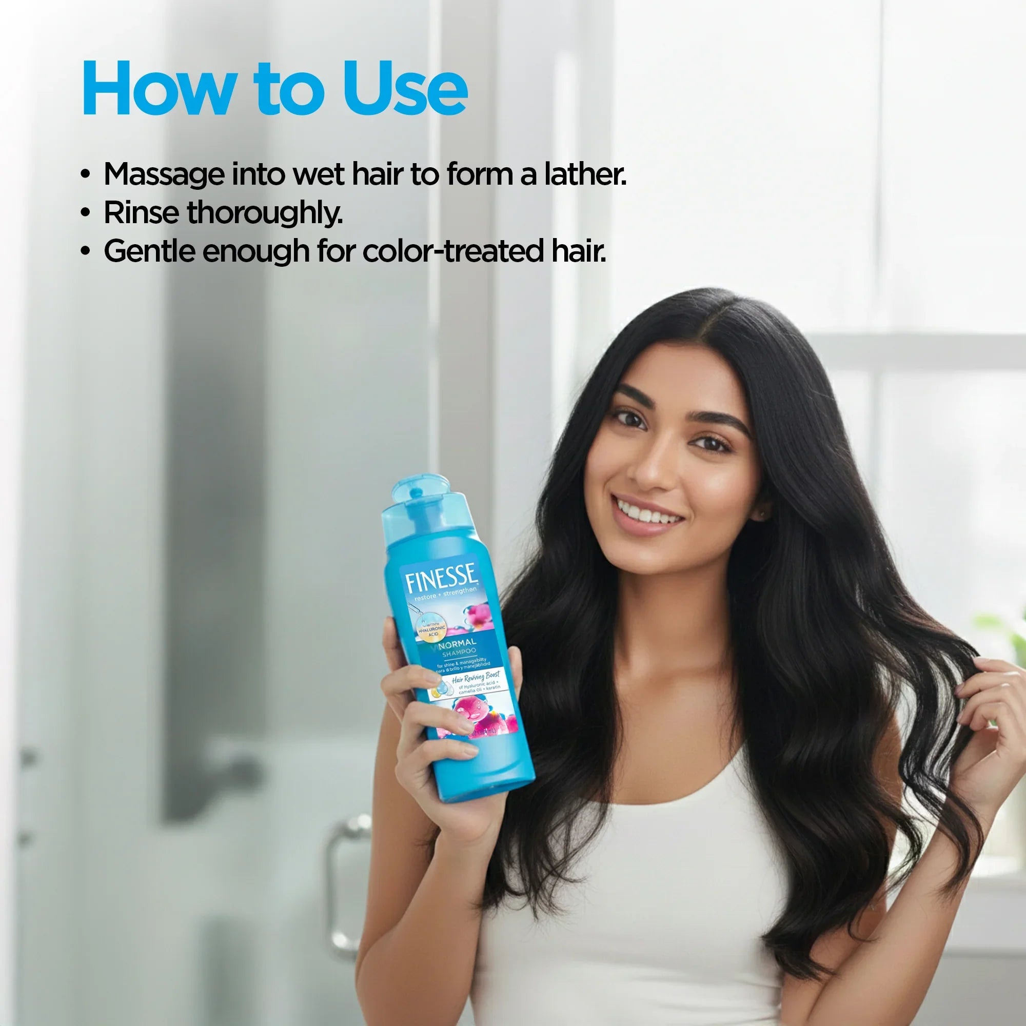 Woman with long black hair holding Finesse Normal Shampoo, Sunbeam Merchantile Ventures product