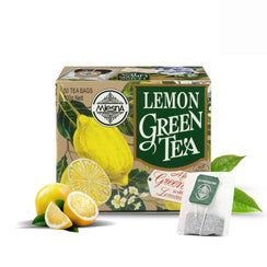 Box of lemon green tea with sliced lemons, tea leaves, and a tea bag in front
