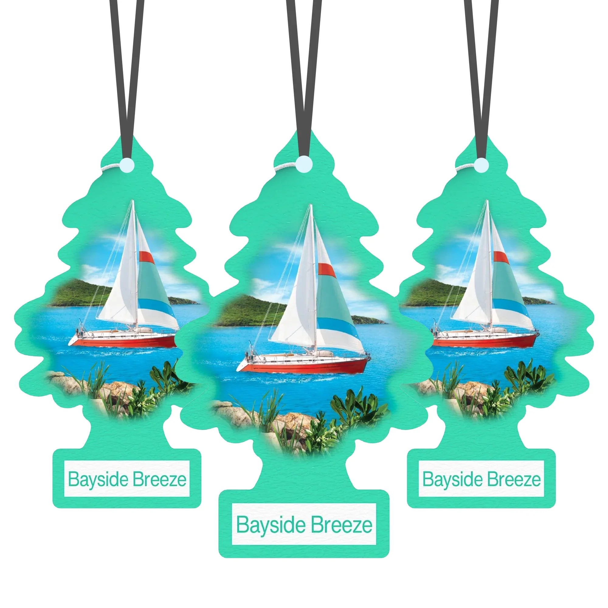 Three Bayside Breeze Little Trees air fresheners with sailboat and coastal scene hanging by black strings
