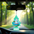 Bayside Breeze scented car air freshener shaped like a tree with sailboat on blue water, hanging from rearview mirror