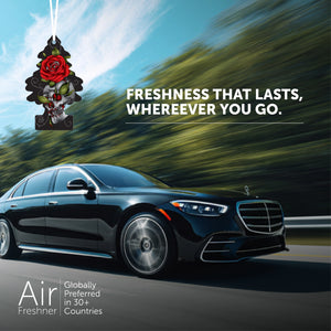 Black luxury car driving fast on road with Little Trees Rose Thorn hanging air freshener and freshness slogan