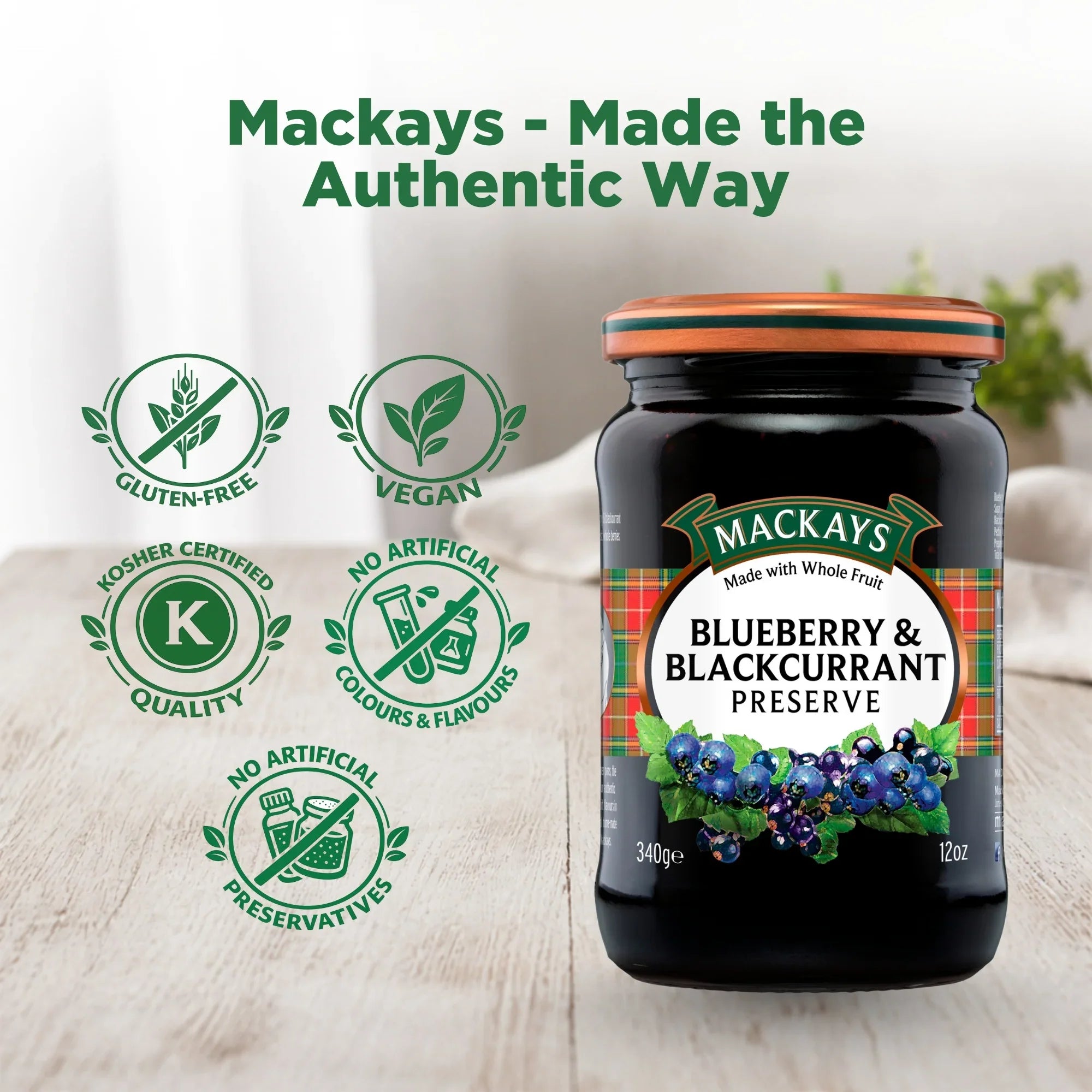 Mackays Blueberry & Blackcurrant Preserve jar on a table, showing vegan, gluten-free, kosher certified, no artificial preservatives or colours icons.