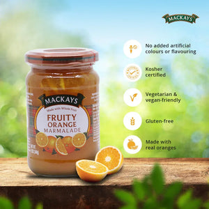 Mackays Fruity Orange Marmalade jar on wooden surface with sliced oranges and health benefit icons