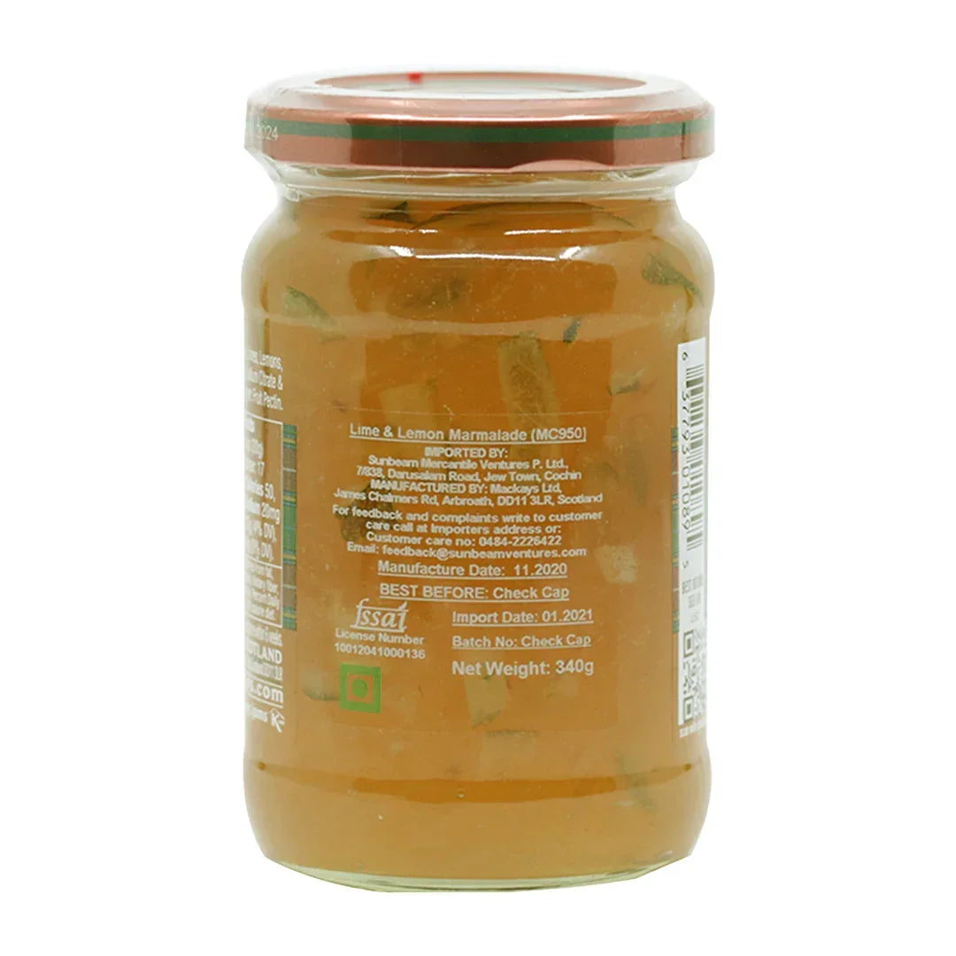 Glass jar of Mackays Lime and Lemon Marmalade with visible citrus peel inside and label details