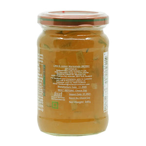 Glass jar of Mackays Lime and Lemon Marmalade with visible citrus peel inside and label details