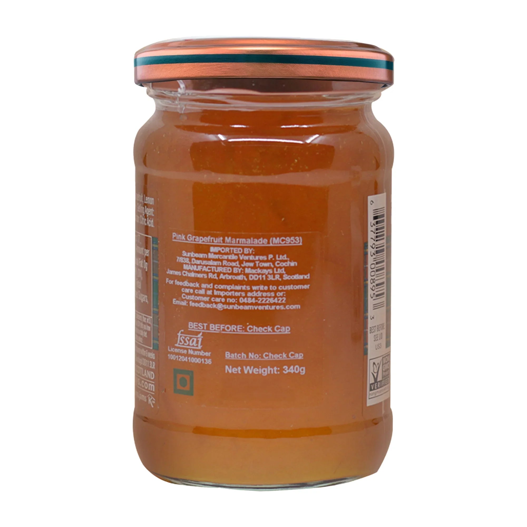 Glass jar of pink grapefruit marmalade, labeled with ingredients and product information.