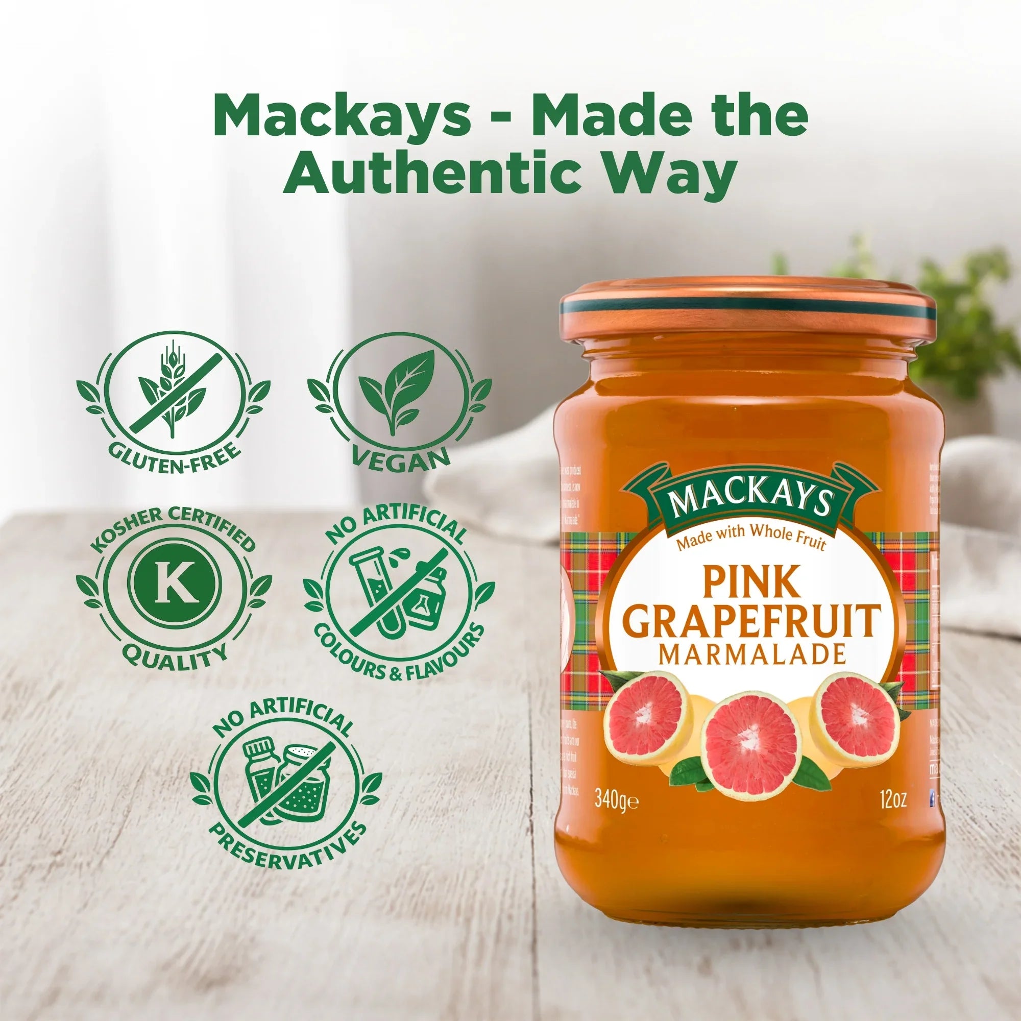 Mackays Pink Grapefruit Marmalade jar on wooden table, vegan, gluten-free, no artificial preservatives