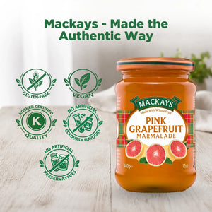 Mackays Pink Grapefruit Marmalade jar on wooden table, vegan, gluten-free, no artificial preservatives