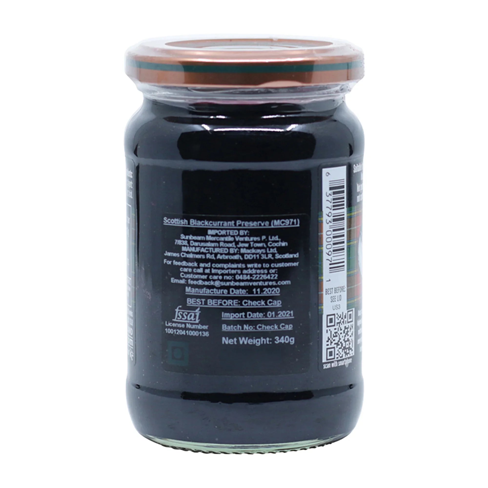 Jar of Mackays Scottish Blackcurrant Preserve with detailed label and barcode on white background