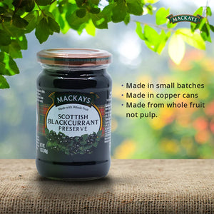 Jar of Mackays Scottish Blackcurrant Preserve on burlap with green leaves and product benefits text