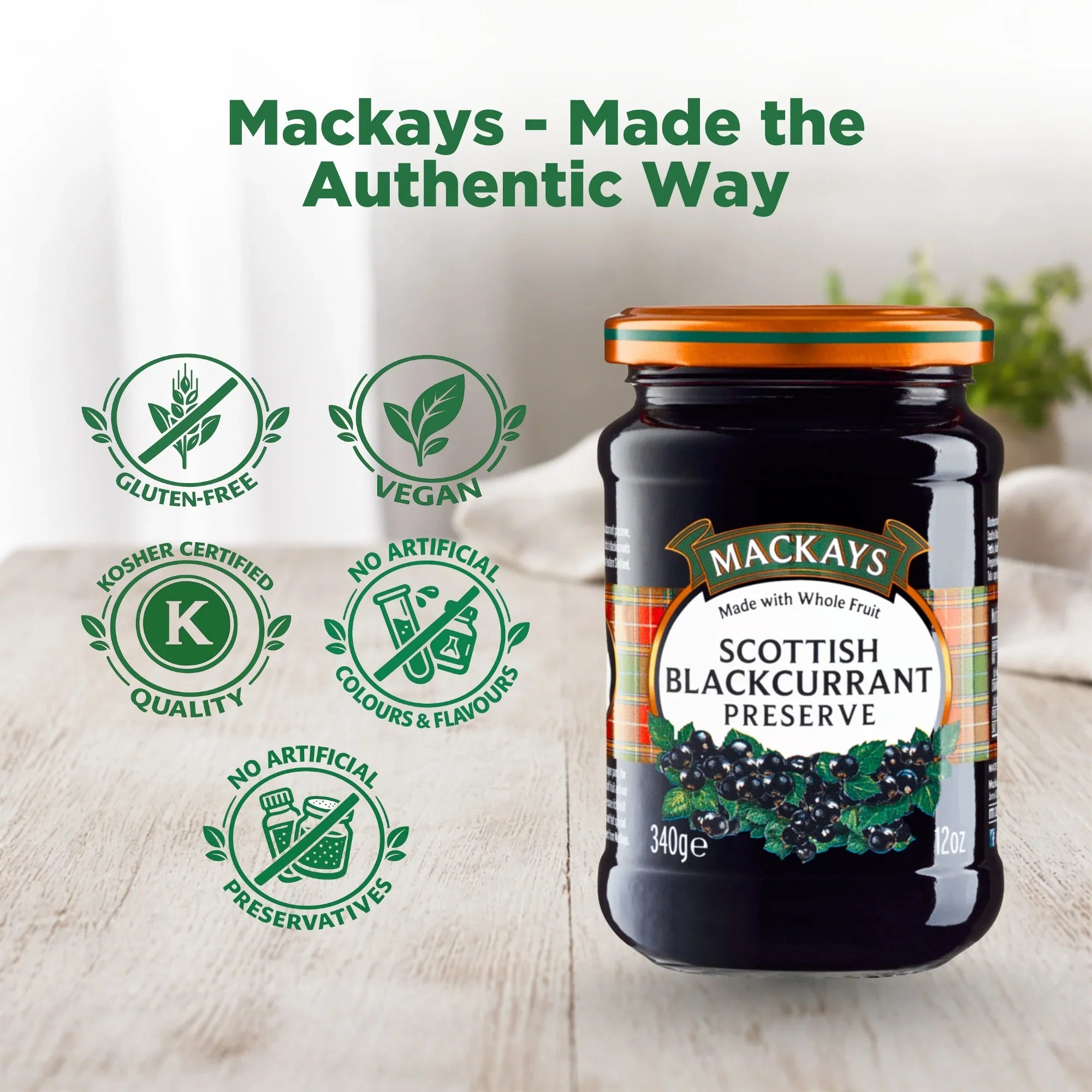 Jar of Mackays Scottish Blackcurrant Preserve on wooden table, vegan, gluten-free, no artificial preservatives or colours.