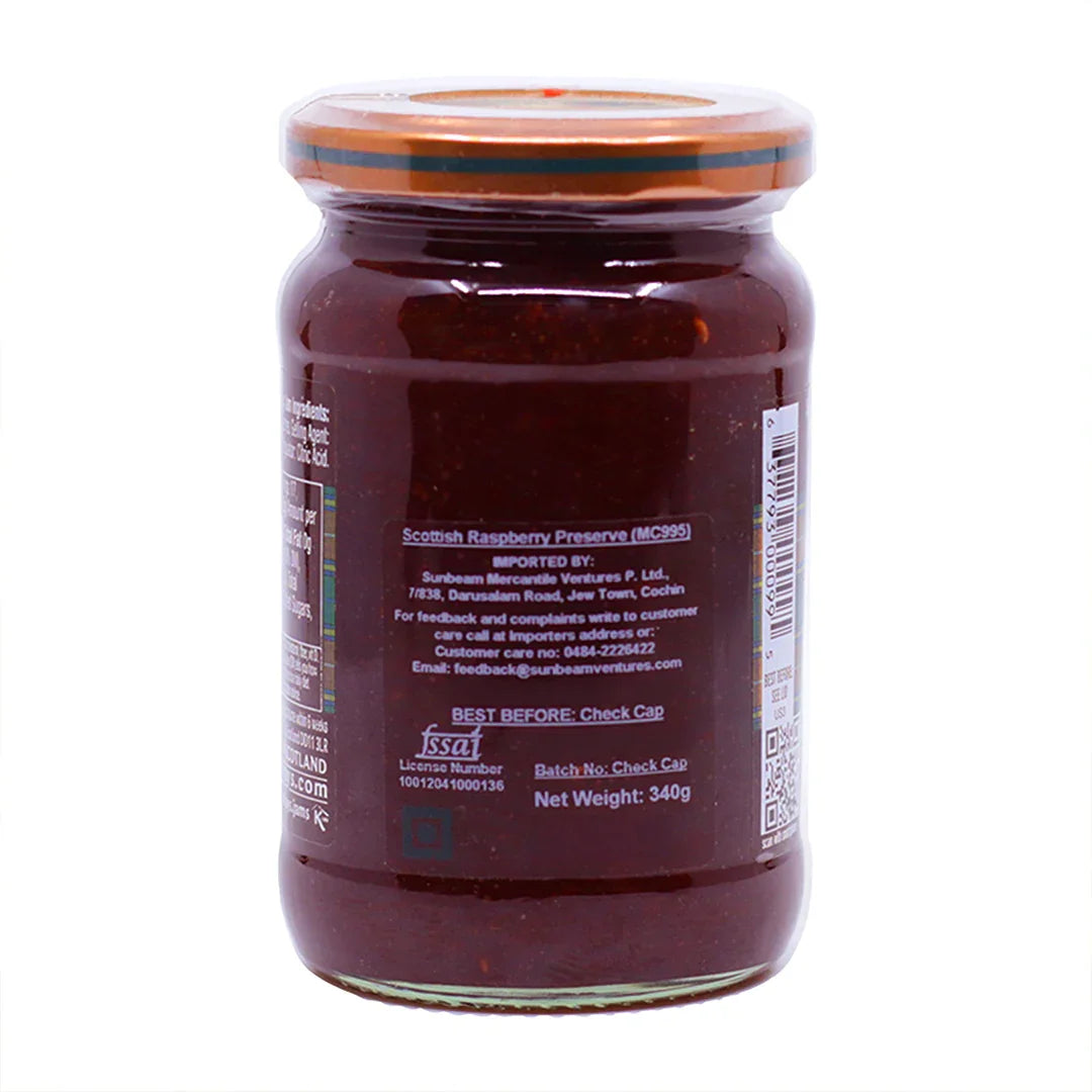 Back view of a jar containing Scottish raspberry preserve, showing ingredient and importer information.