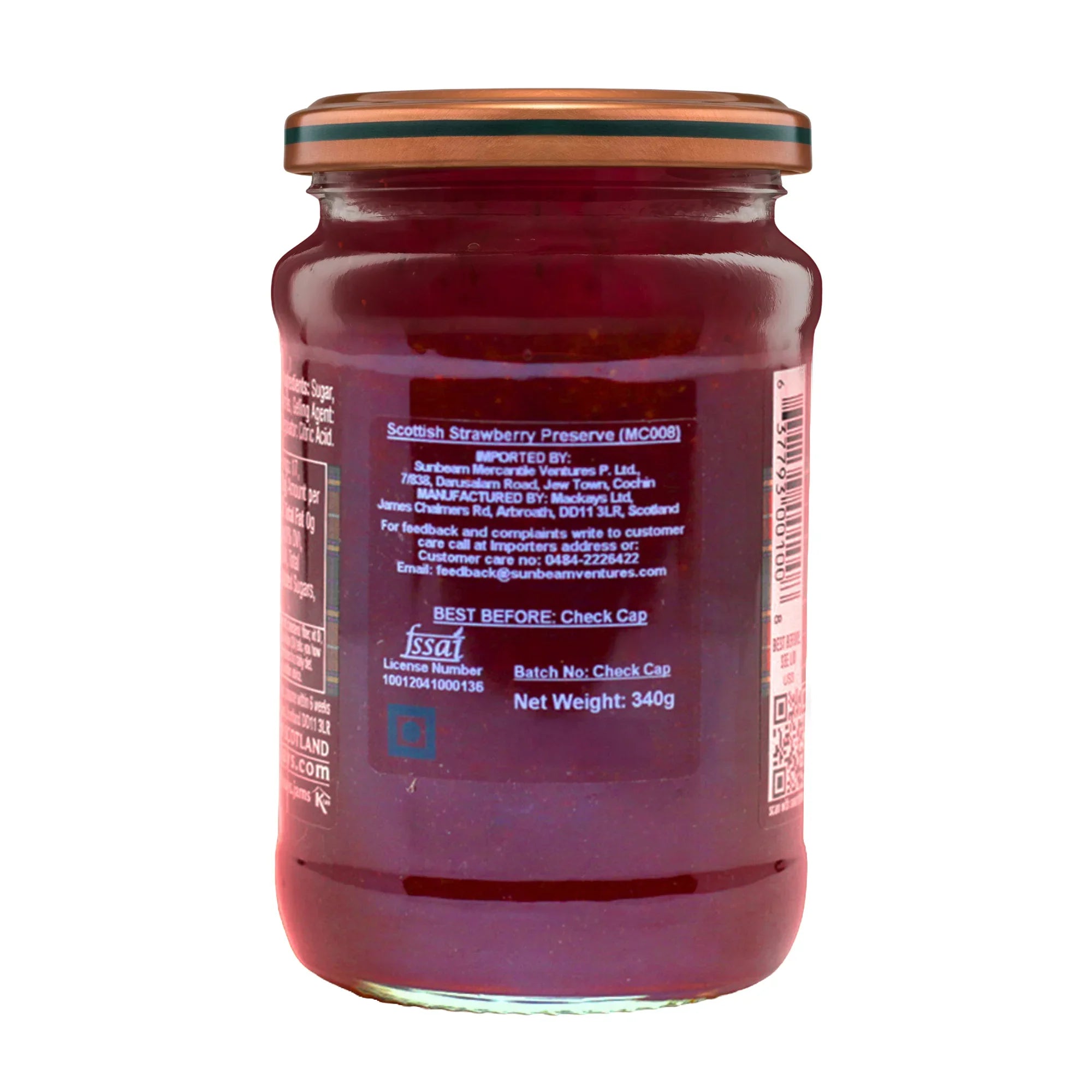 Back view of a glass jar labeled Scottish strawberry preserve, showing ingredients and product details.