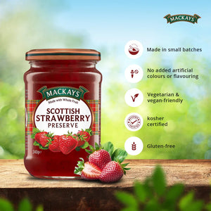 Mackays Scottish Strawberry Preserve jar on wooden surface with fresh strawberries and product benefits listed