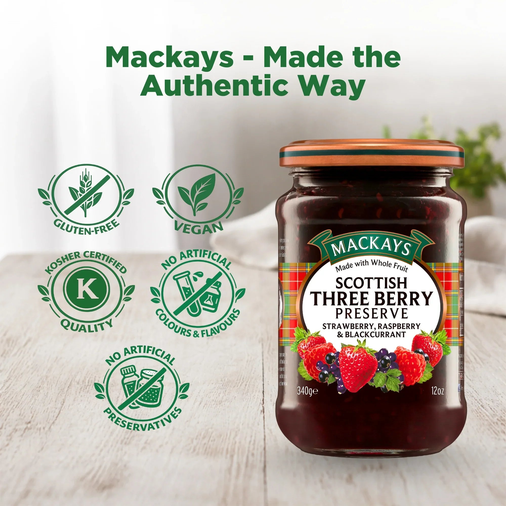 Mackays Scottish Three Berry Preserve jar on table with gluten-free, vegan, kosher, no artificial additives badges.