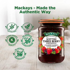 Mackays Scottish Three Berry Preserve jar on table with gluten-free, vegan, kosher, no artificial additives badges.