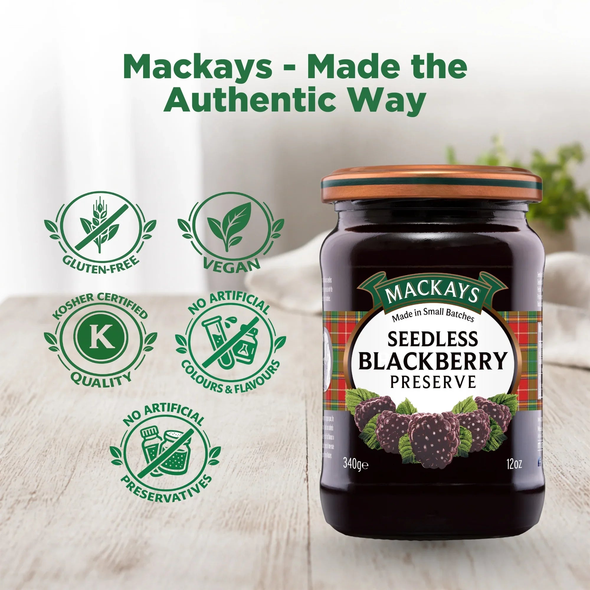 Mackays Seedless Blackberry Preserve jar on table with gluten-free, vegan, kosher, and no artificial additives icons.