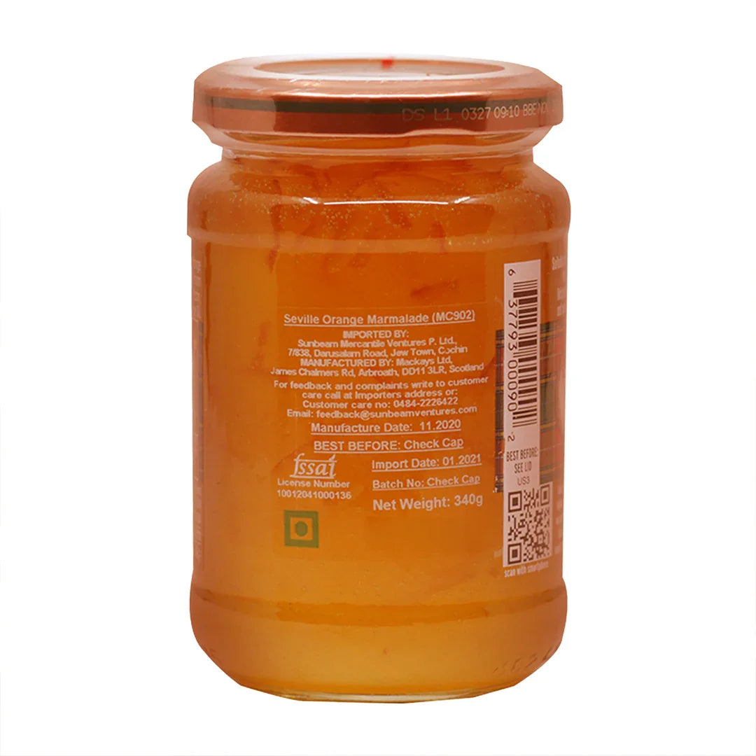 Jar of Mackays Seville Orange Marmalade with orange lid and label showing manufacturing details