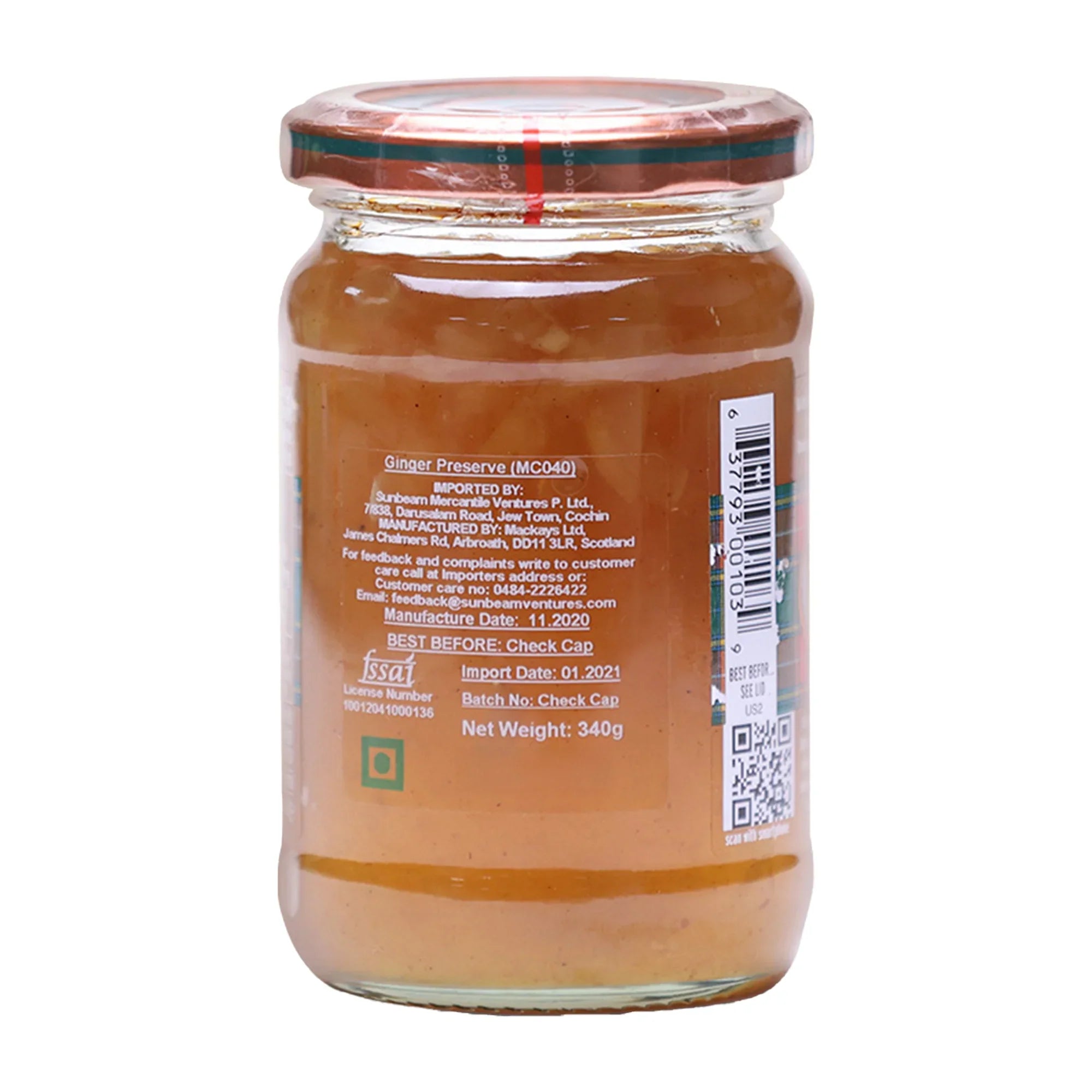 Glass jar of Mackays Spiced Ginger Marmalade with label showing ingredients, weight, and barcode