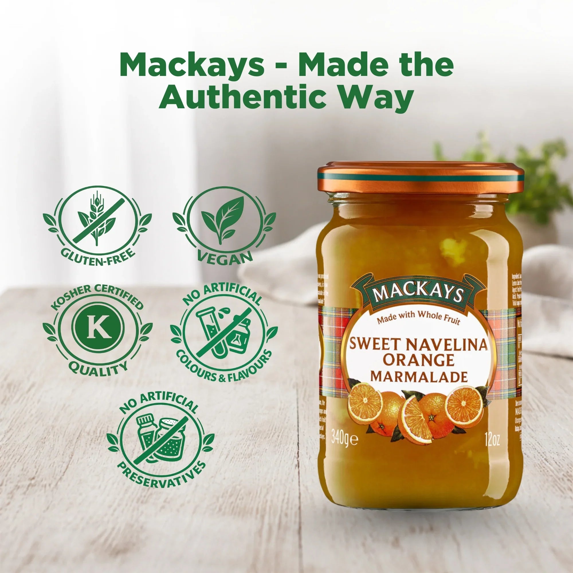 Mackays Sweet Navelina Orange Marmalade jar on wooden table with gluten-free, vegan, kosher, no artificial colors, and preservative-free icons.