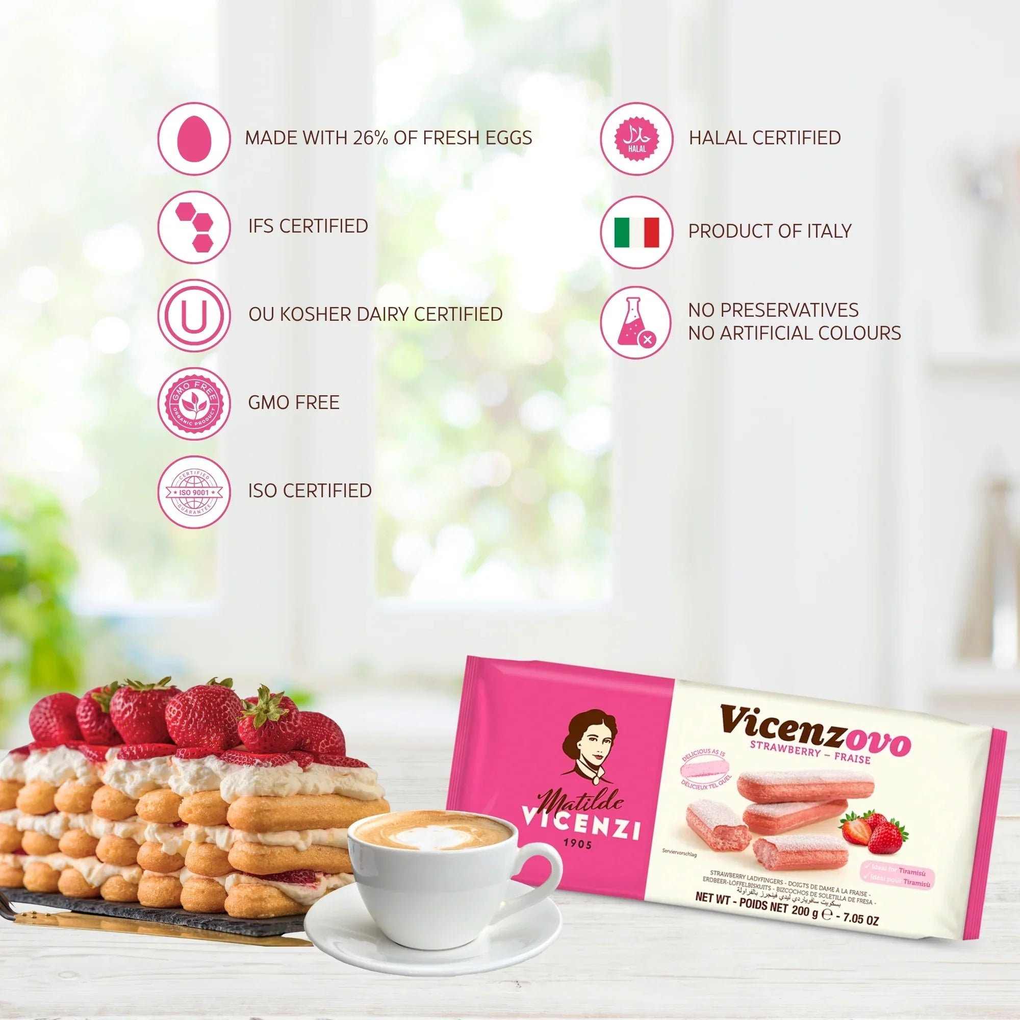 Vicenzovo strawberry biscuits with cream, strawberries, and coffee on table, certifications shown.