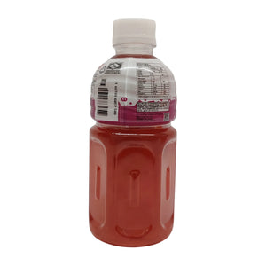 Back view of a plastic bottle with pink grape-flavored drink and nutrition label visible