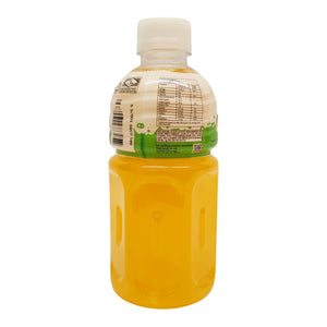 Back view of a mango juice drink bottle with nutrition label and yellow liquid