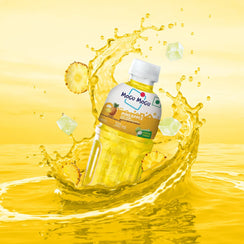 Mogu Mogu Pineapple juice drink bottle with nata de coco, pineapple slices, and ice splashing in yellow liquid.