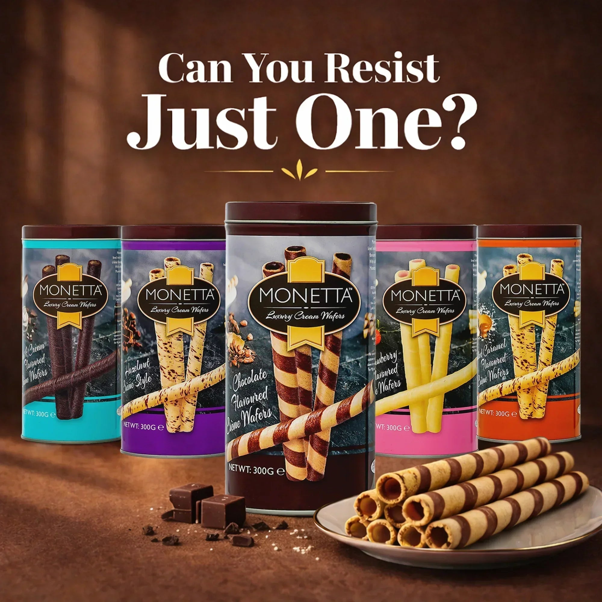 Assorted Monetta luxury cream wafer roll tins with plate of chocolate and vanilla wafer rolls