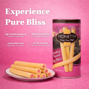 Strawberry cream wafer sticks on a plate beside a tin against a pink background