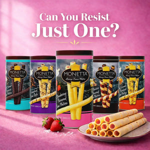 Assorted Monetta cream wafer sticks in tins, strawberry flavor in focus, with plate and strawberries