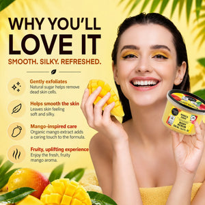 Smiling woman holding a mango and a jar of Mango Sugar Body Scrub.
