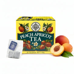Box of peach apricot tea bags with loose tea sachet and fresh peach and apricot fruit