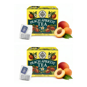 Peach apricot black tea box with teabags and fresh peaches and apricots on white background