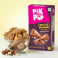Hazelnut mini waffle cones in glass bowl next to Pik n Pop Waffle Wonders Hazelnut Flavor box